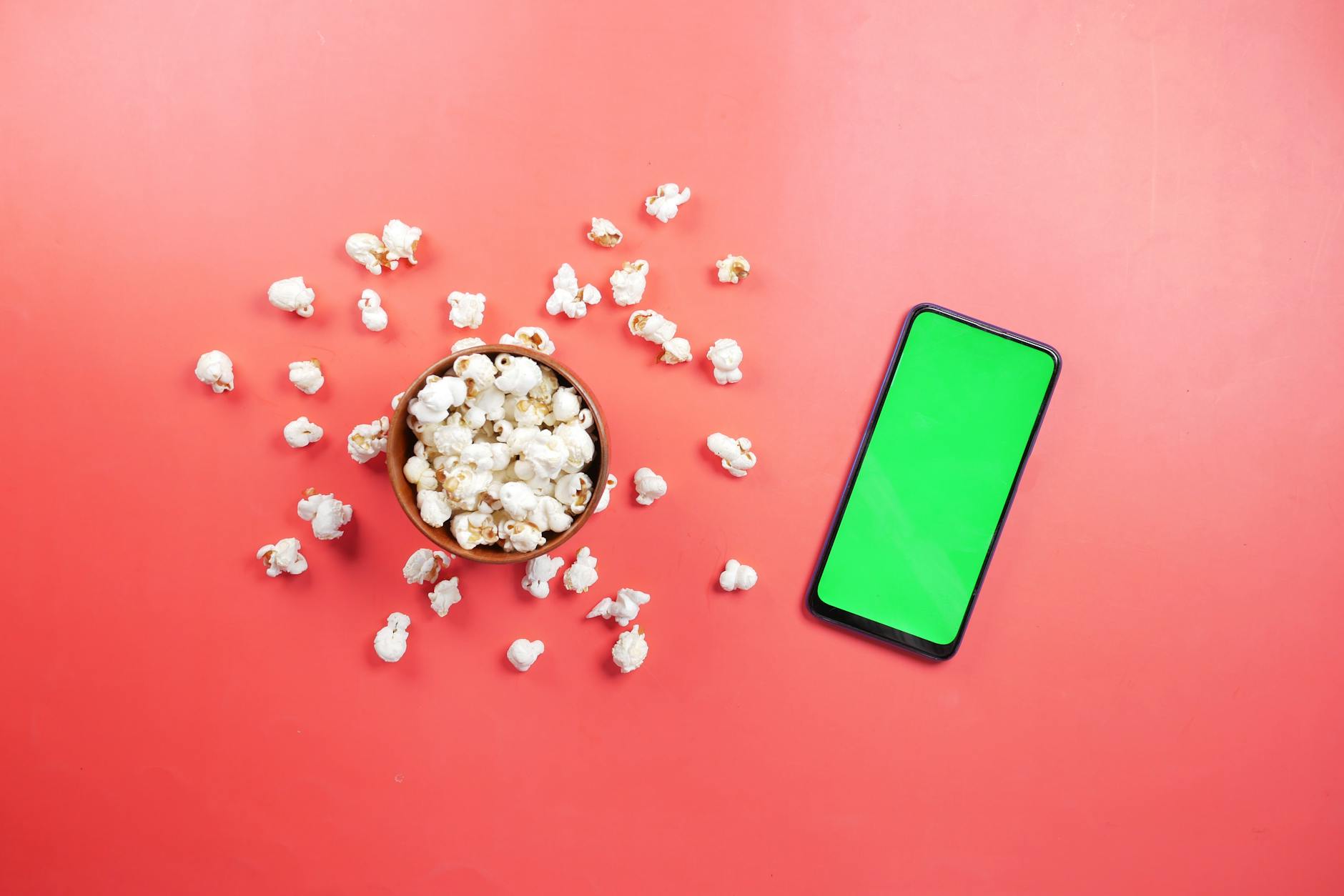 Cinema popcorn and movie tickets on a flat lay