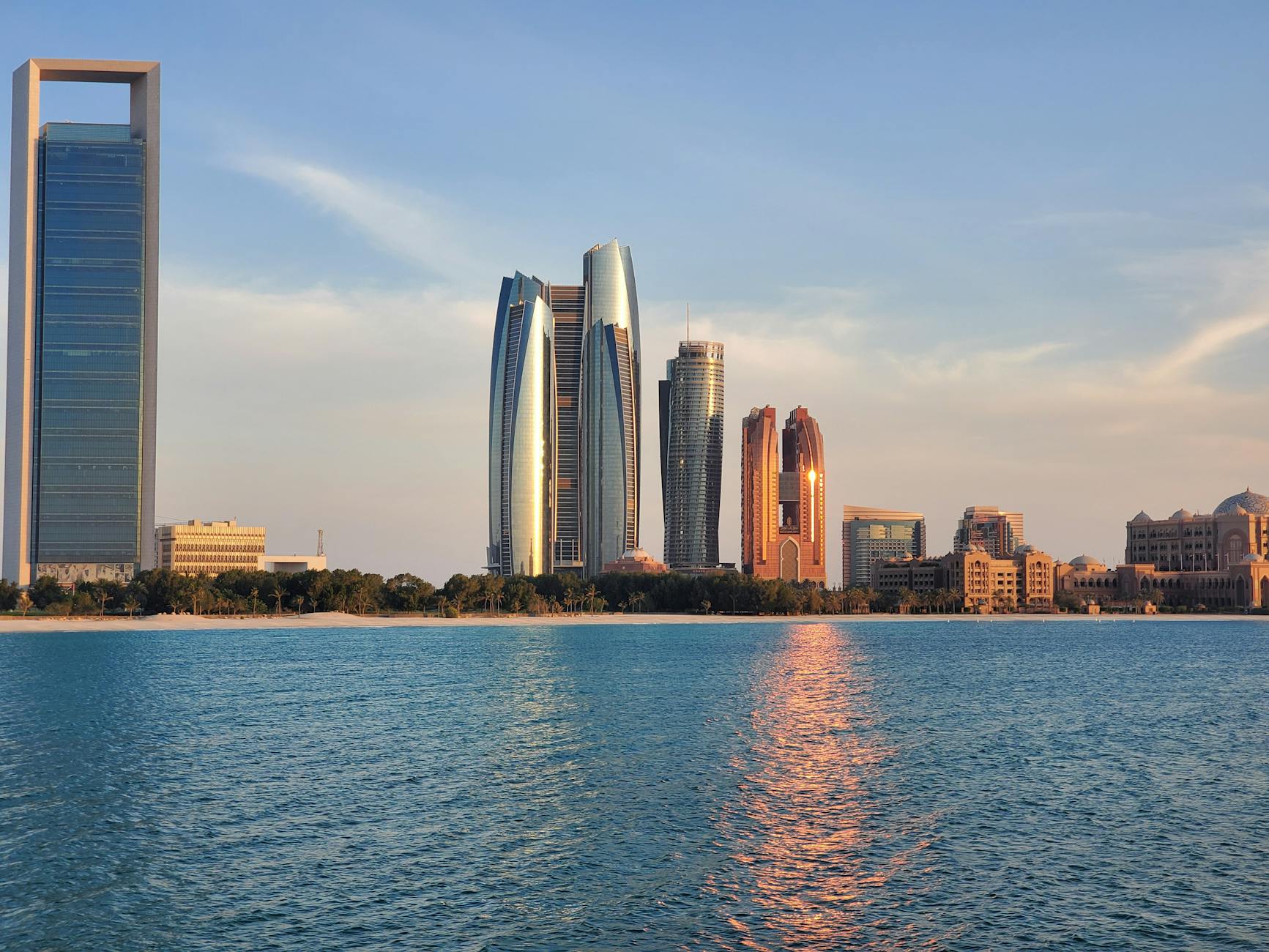 Abu Dhabi Etihad Towers skyline at dusk