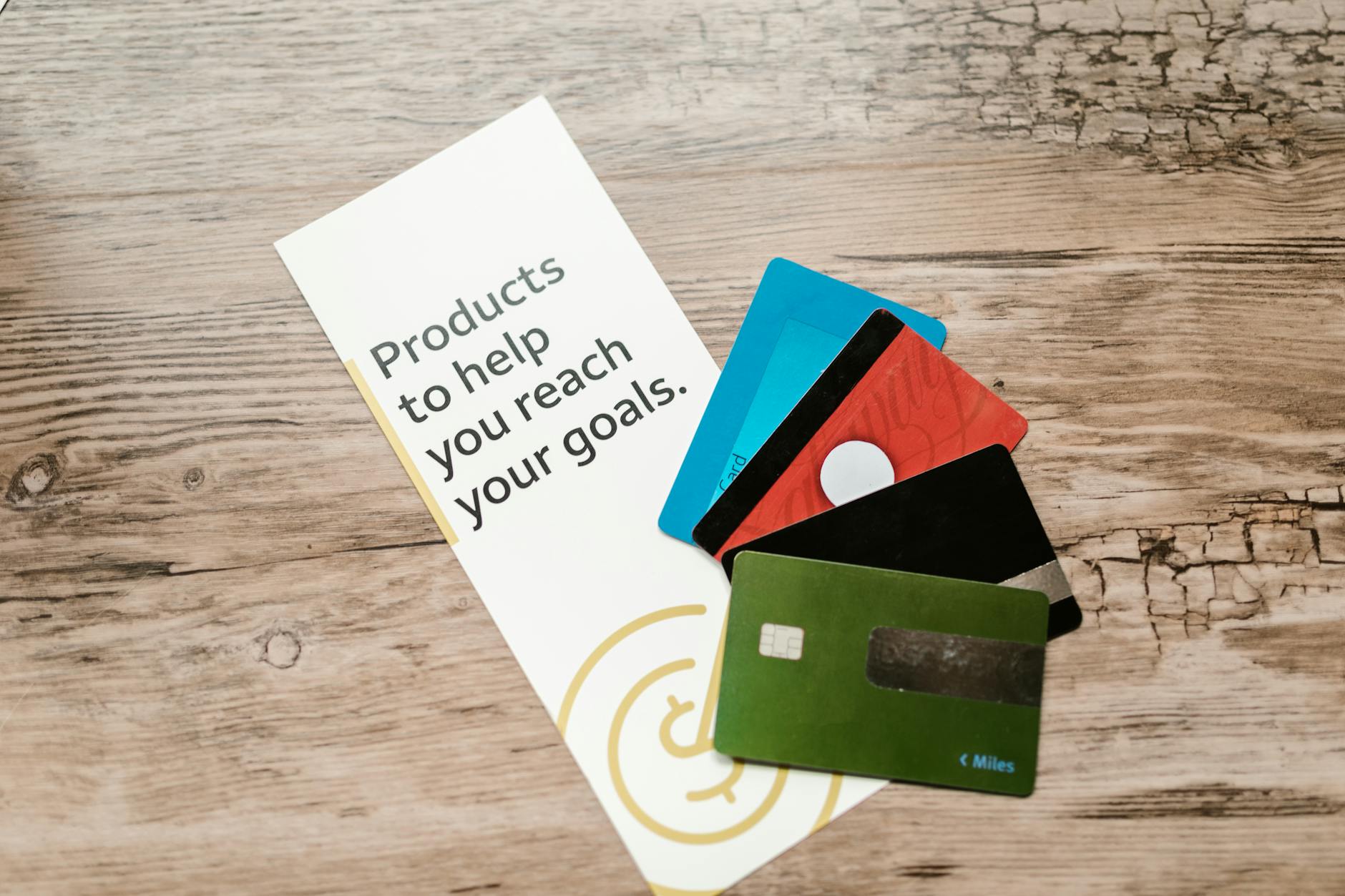 Two credit cards side by side on a marble desk flat lay
