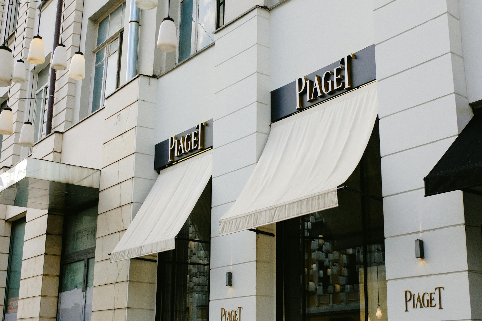 Luxury watch-boutique storefront on a high-end retail street