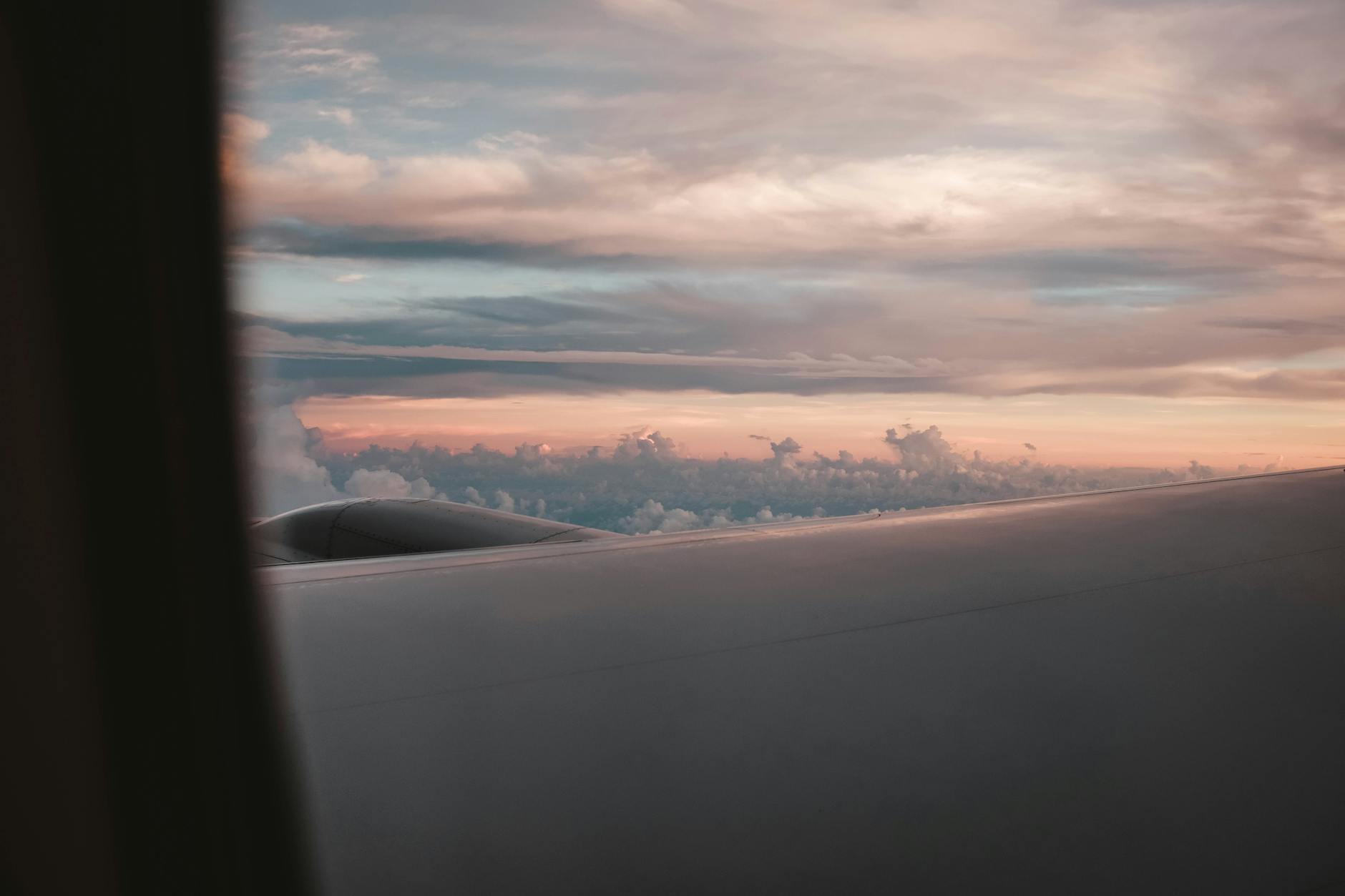 View from a wide-body aircraft window at altitude