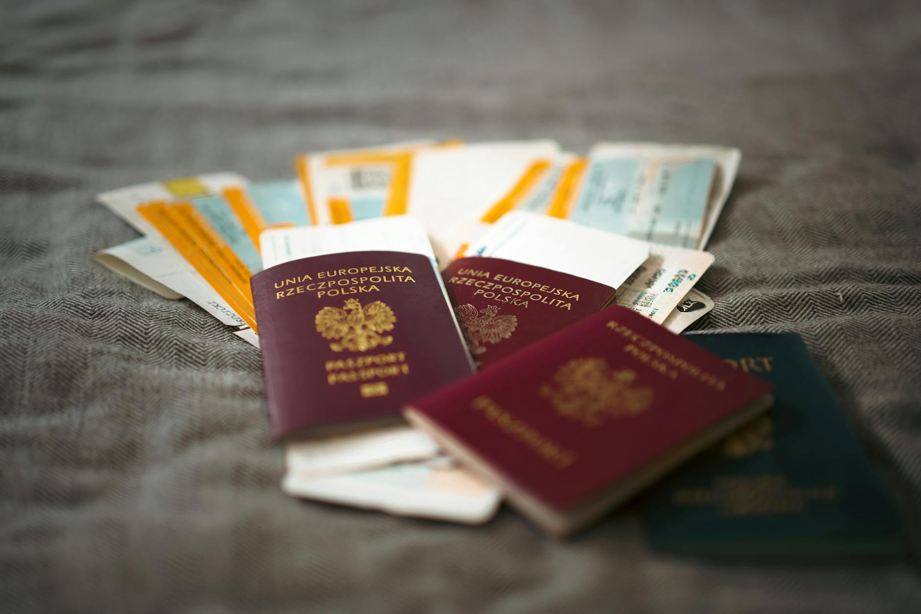 Boarding pass and passport on a summer travel desk