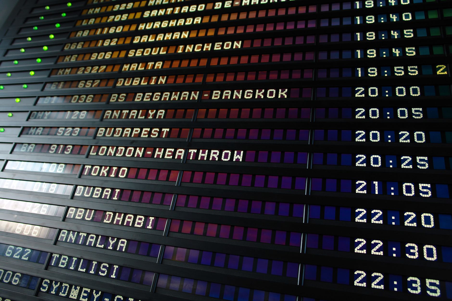 An airport departure board, illustrating a limited-window award-flight booking deadline.