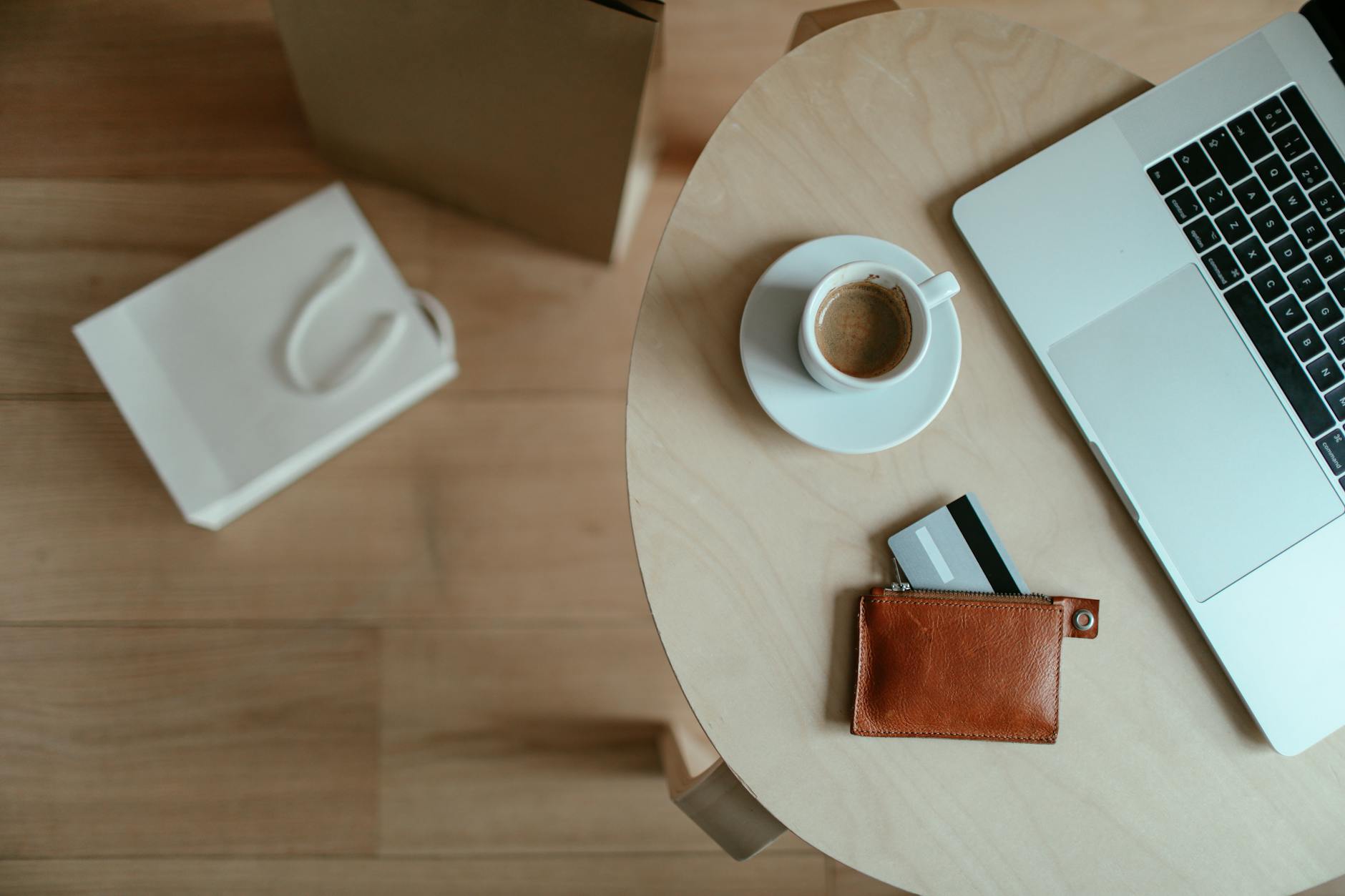 Wallet and credit cards on a cafe table in Dubai